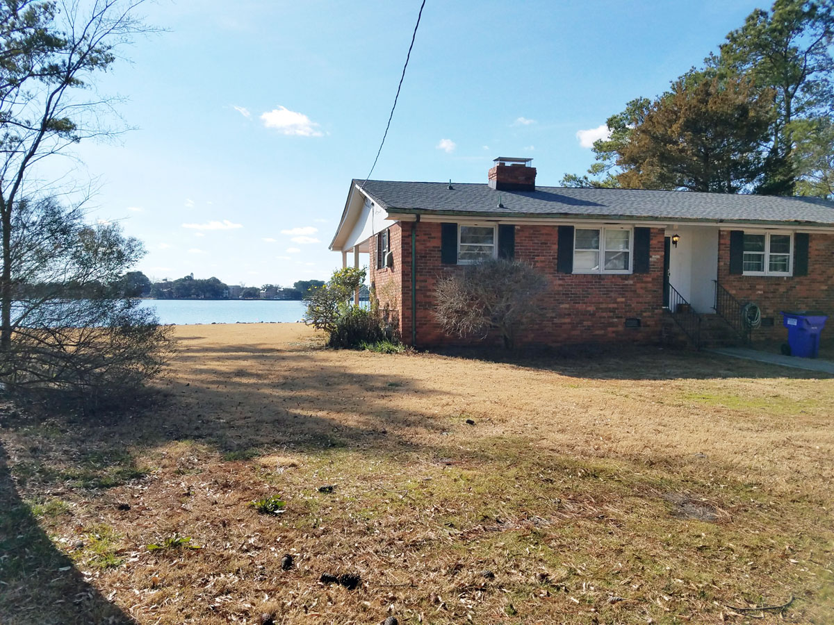 SOLD at auction Estate Sale Waterfront Lot and Home on the