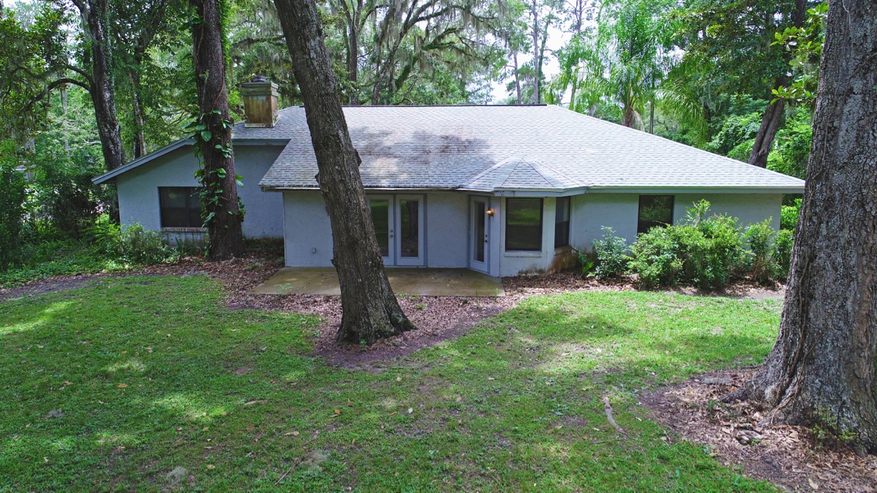 SOLD at auction Woodfields 3BR/2BA on .47+/ Acre Ocala, FL