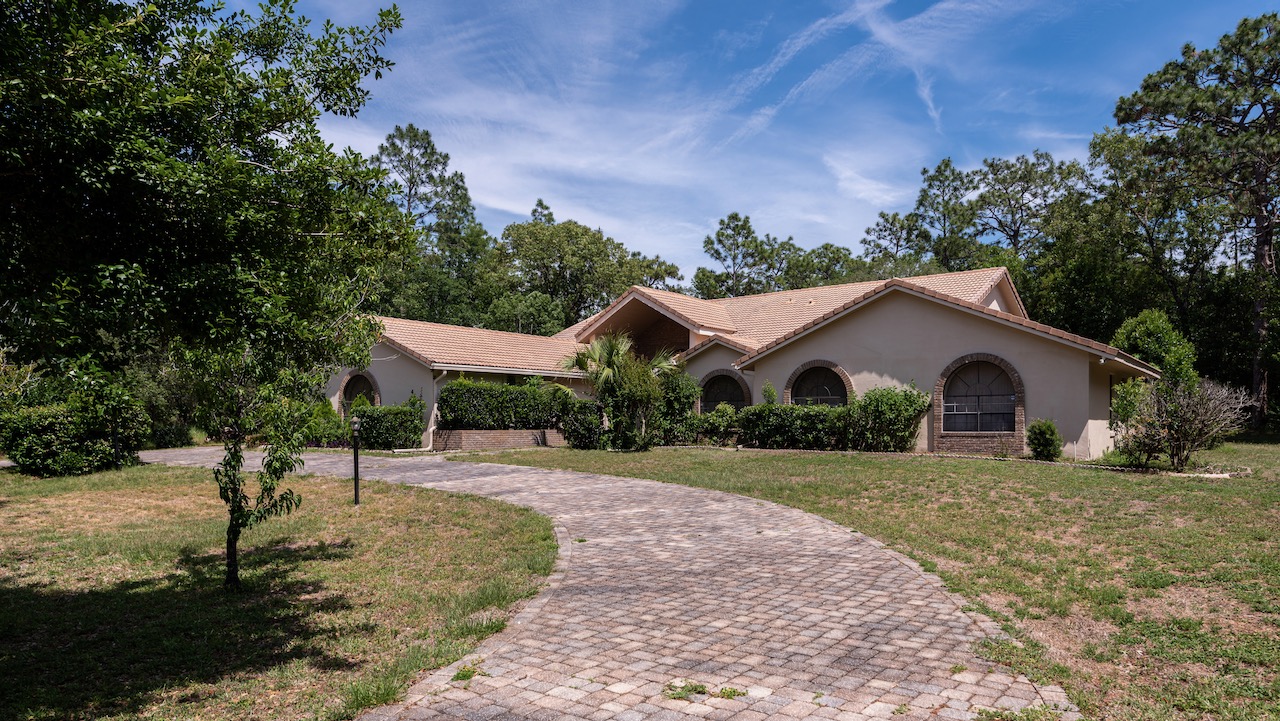 SOLD at auction 4BR/3.5BA Pool Home in Pine Ridge Beverly Hills, FL