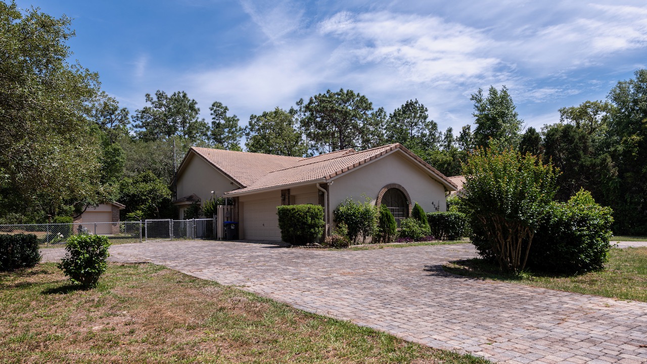 SOLD at auction 4BR/3.5BA Pool Home in Pine Ridge Beverly Hills, FL