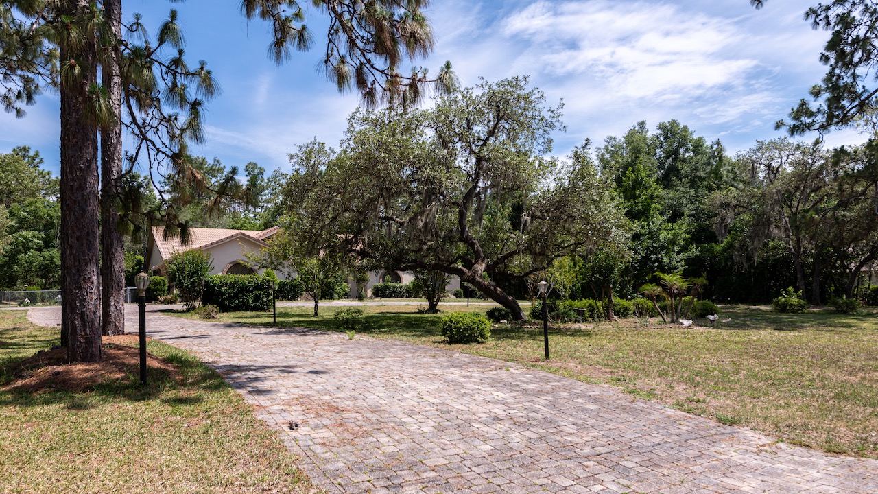 SOLD at auction 4BR/3.5BA Pool Home in Pine Ridge Beverly Hills, FL