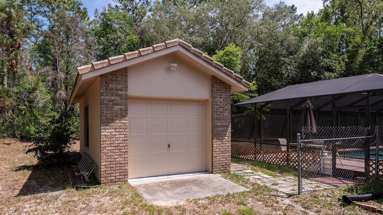 SOLD at auction 4BR/3.5BA Pool Home in Pine Ridge Beverly Hills, FL