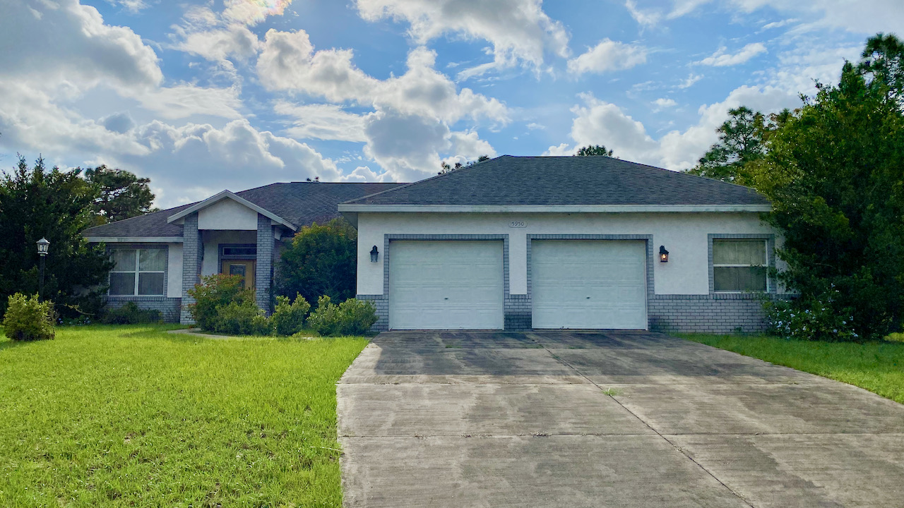 SOLD at auction 3BR/2BA on 1± AC in Pine Ridge Beverly Hills, FL