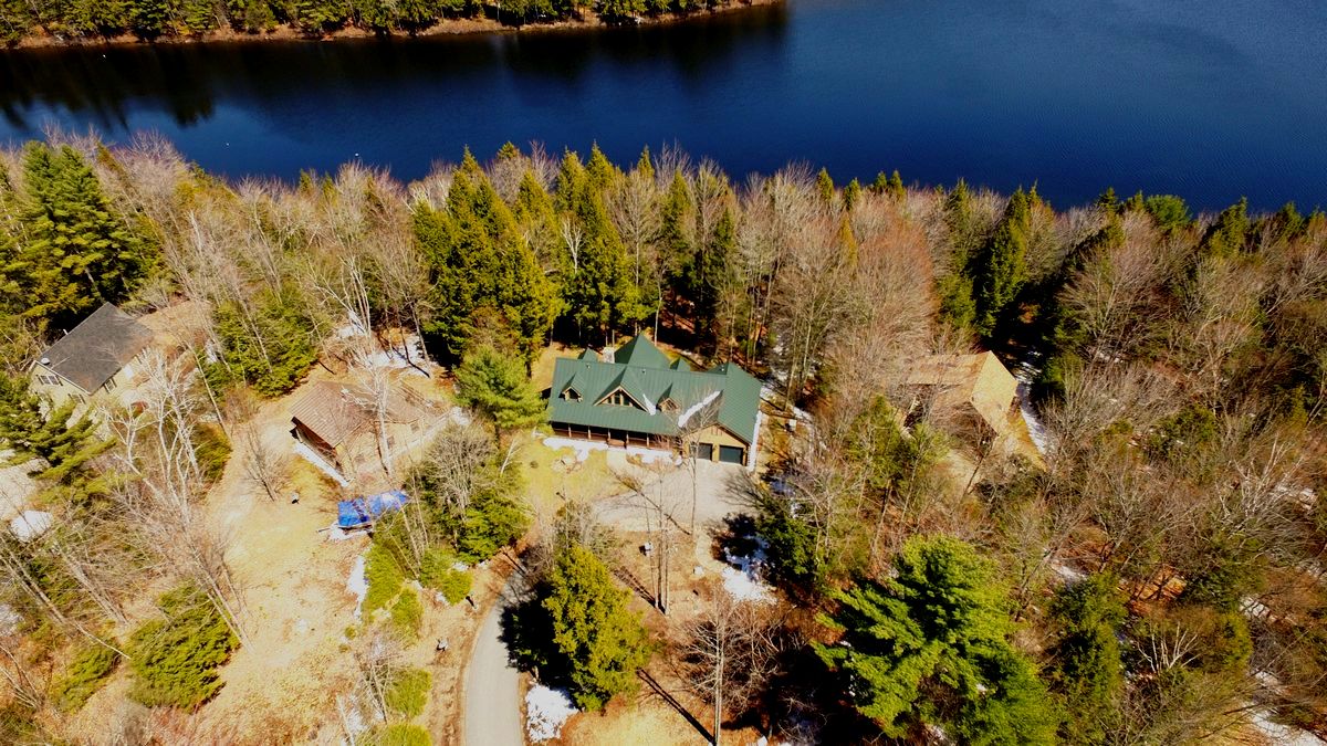 SOLD at auction Lender Ordered Waterfront Classic LogStyle Home
