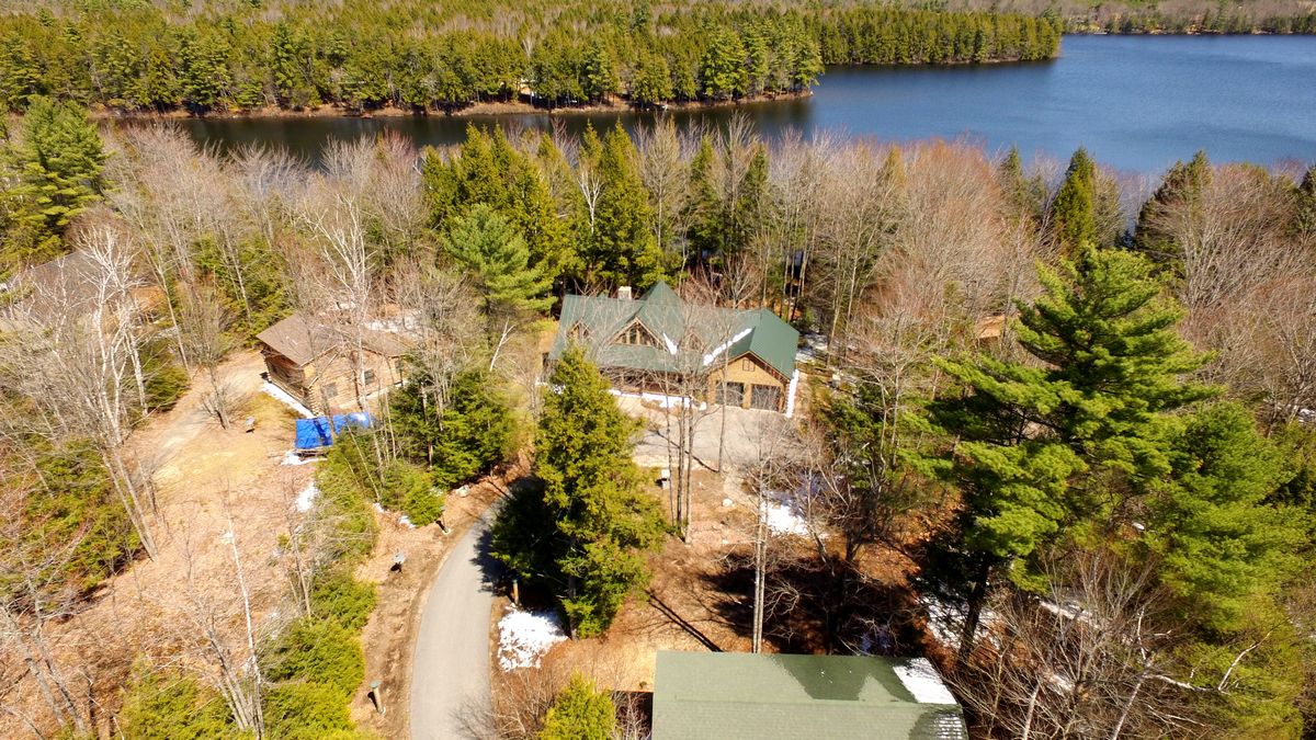 SOLD at auction Lender Ordered Waterfront Classic LogStyle Home