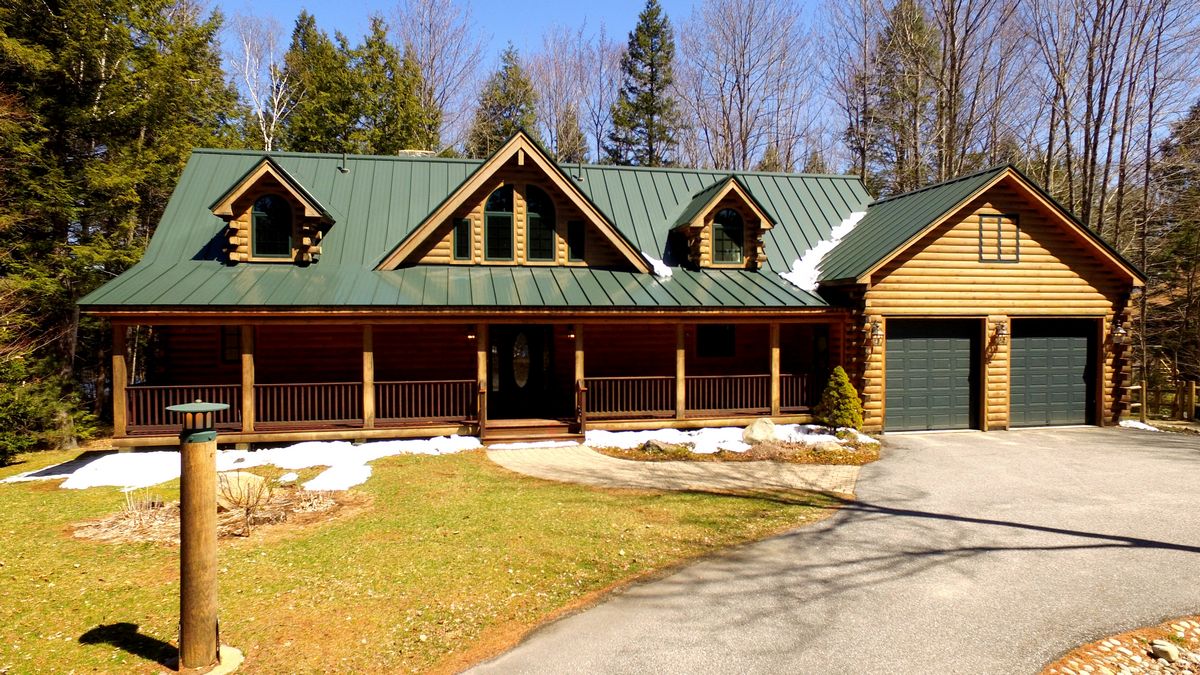 SOLD at auction Lender Ordered Waterfront Classic LogStyle Home