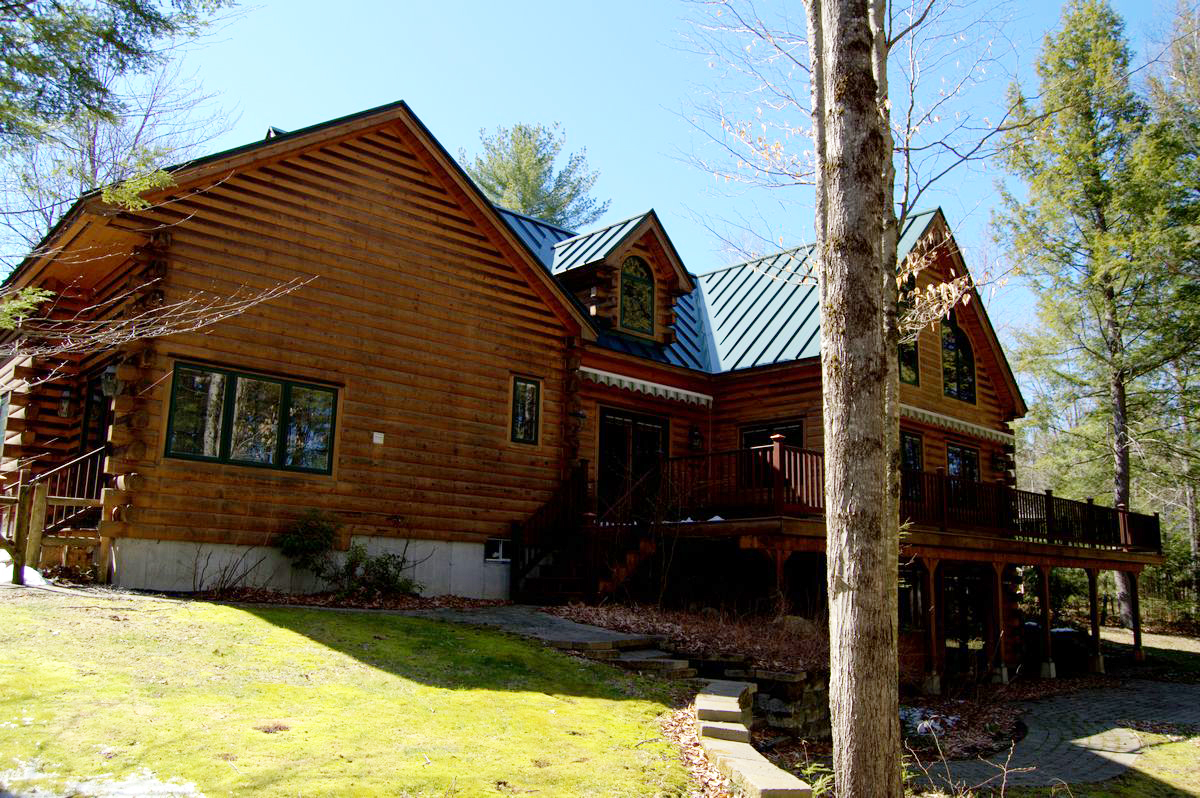 SOLD at auction Lender Ordered Waterfront Classic LogStyle Home