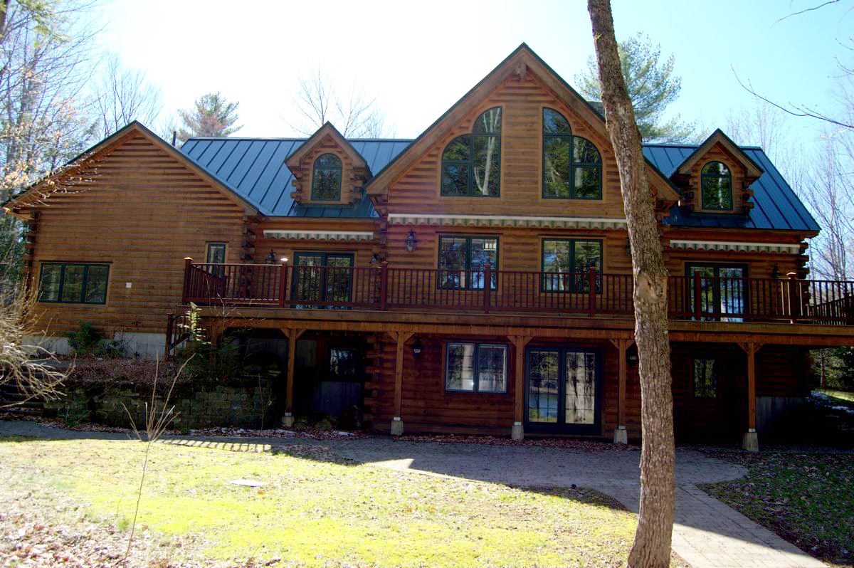 SOLD at auction Lender Ordered Waterfront Classic LogStyle Home